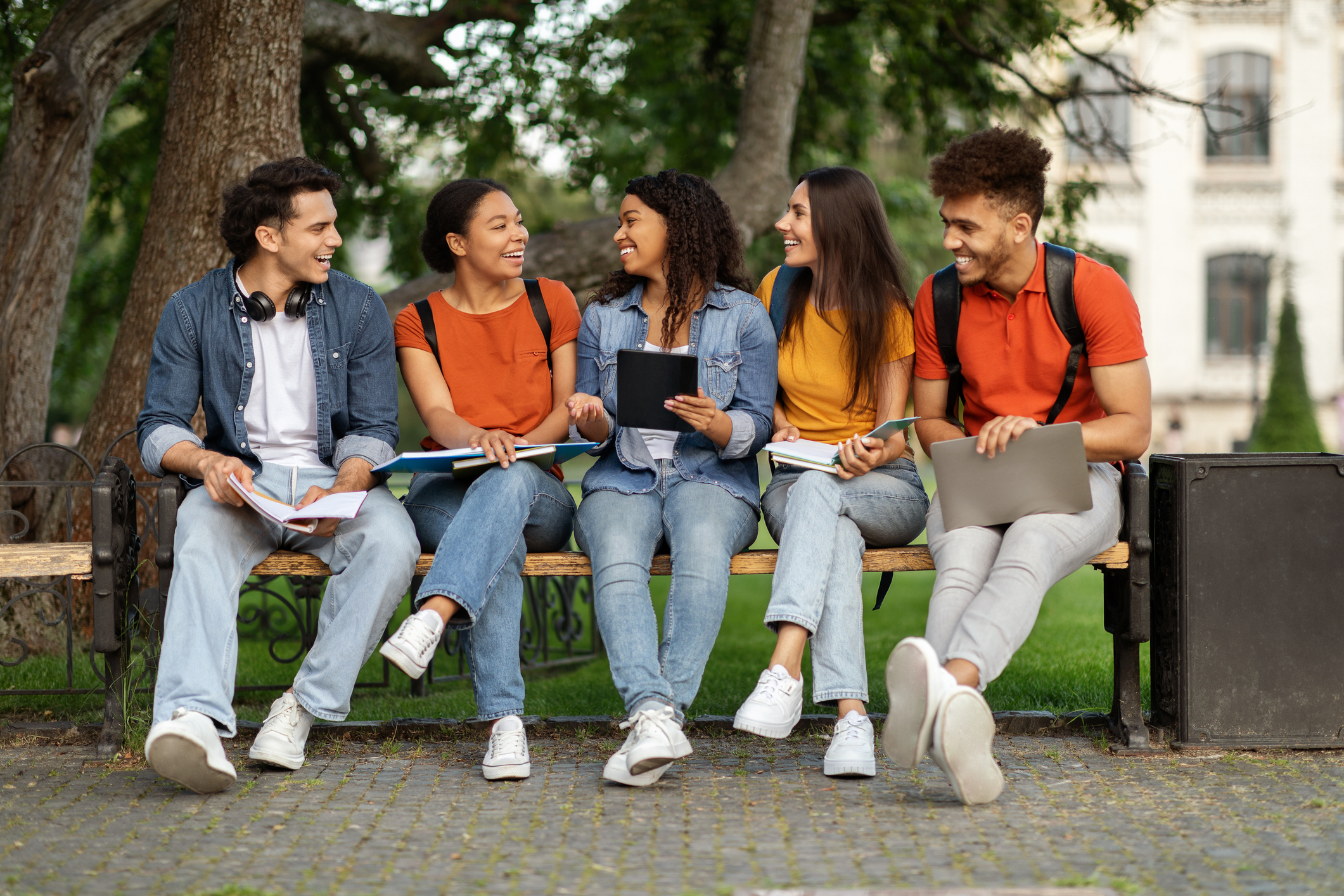 Students sitting on a bench