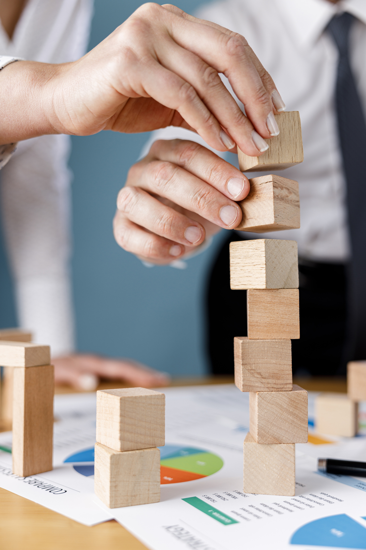 Two People Building Blocks