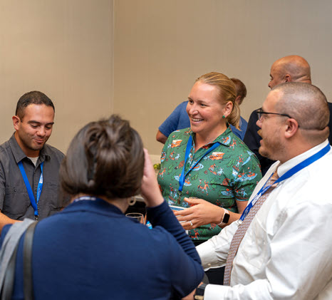 First-Time Attendees Enjoying the Mixer