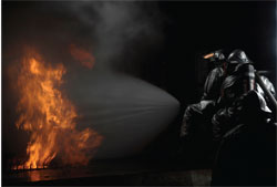 Firemen extinguishing a fire