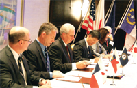 REPRESENTATIVES FROM NCEES AND THE ENGINEERING BOARDS OF TEXAS, NORTH CAROLINA, AND KENTUCKY FORMALIZED THEIR ORGANIZATION’S AGREEMENTS WITH JPEC AT THE DECEMBER 18 SIGNING CEREMONY IN TOKYO, JAPAN. LEFT TO RIGHT ARE LANCE KINNEY, P.E., OF THE TEXAS ENGINEERING BOARD; ANDREW RITTER OF THE NORTH CAROLINA BOARD; DAVID COX OF THE KENTUCKY BOARD; JPEC PRESIDENT MASAMI YOSHIMOTO, P.E..; NCEES PRESIDENT PATTY MAMOLA, P.E.; AND NCEES CEO JERRY CARTER