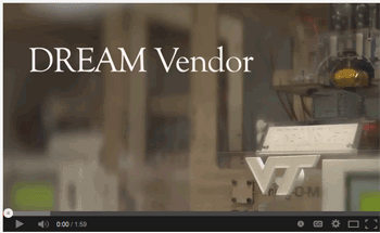A Virginia Tech engineering grad student shows off the school’s DreamVendor, a 3D printing “vending machine.”  Credit: Virginia Tech