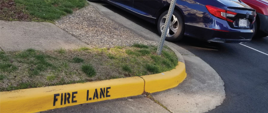 fire lane curb painted in yellow