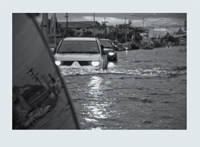 Car moving through water.