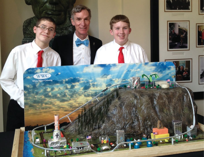 Pictured with Bill Nye the Science Guy is Tanner Schantz (left) and Joshua Troutman, one of two Future City competition teams who presented their projects at the 2014 White House Science Fair. The team from Bismarck, North Dakota, is pictured with their city Whitewater Crossing, which uses a monorail to solve transportation problems stemming from mountainous terrain. Representing Carrie’s Kids, an after-school program helping at-risk and homeless children, the team won the Future City Minnesota regional people’s choice award. Also at the White House fair was the team from the Albuquerque Academy in New Mexico.