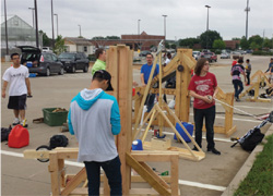 STUDENTS TEST OUT THE TREBUCHETS THEY DESIGNED AND BUILT IN RUSS BYWATER, P.E.’S PRINCIPLES OF ENGINEERING CLASS.