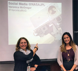 MOJARAD STANDS WITH THE NEWS AND SOCIAL MEDIA MANAGER FOR NASA’S JET PROPULSION LABORATORY.