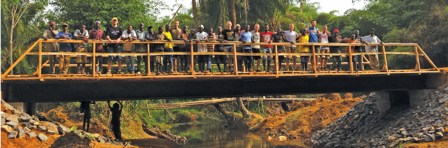 DORDT COLLEGE STUDENTS AND LIBERIANS WORKED TOGETHER TO BUILD THE 53-FOOT BRIDGE, WHICH WILL<br />
ENABLE VEHICLE TRAVEL AND ACCESS TO RESOURCES.