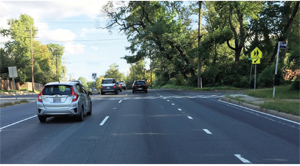 Intersection is a school crossing and has a bus stop.