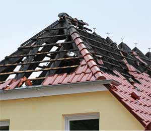 House roof with fire damage