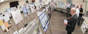 NSPE EXECUTIVE DIRECTOR MARK GOLDEN REVIEWS THE ENTRIES FOR THE NCEES ENGINEERING EDUCATION AWARD.