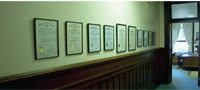 THIS WALL SHOWCASES ALL OF THE PROFESSIONAL ENGINEERING LICENSES FOR THOSE WHO HAVE WORKED AT HORNOR BROTHERS ENGINEERS.