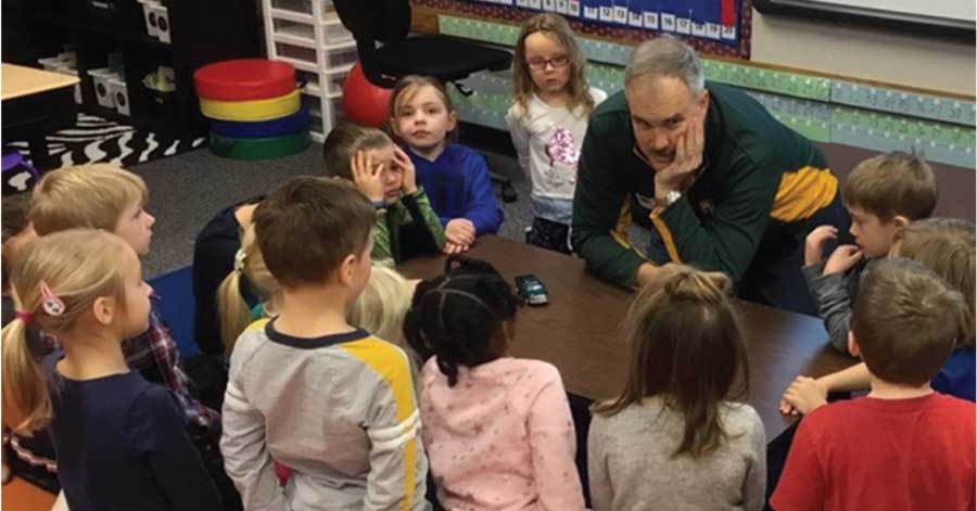 THE AUTHOR ENJOYS SPENDING TIME WITH A KINDERGARTEN CLASS SOLVING A PROBLEM: BUILDING A ROBOT TO CAPTURE A MOUSE IN THE CLASSROOM.