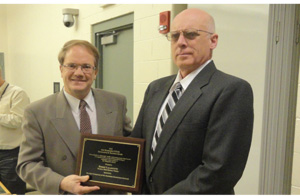 ROBERT ROTIER (LEFT) PRESENTS ROBERT LALANCETTE, A TEACHER AT NASHUA NORTH HIGH SCHOOL, WITH A STEM EXCELLENCE IN TEACHING AWARD IN 2018.