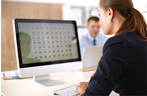 Woman working at a computer