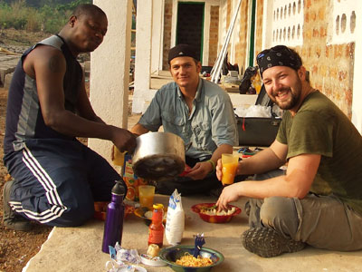 VIDA volunteers take a much-needed lunch break after working 16 hours in the hot sun.
