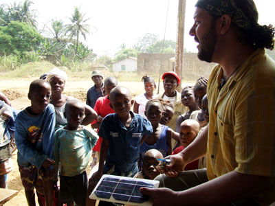 Off-grid solar consultant and VIDA volunteer Dave Lettero meets with the Hangah Town community and elders to explain how solar works and the construction plan.