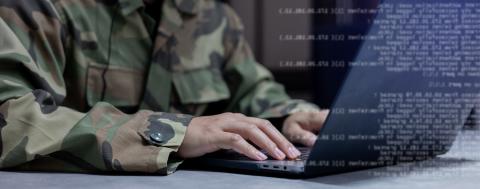 military member at computer